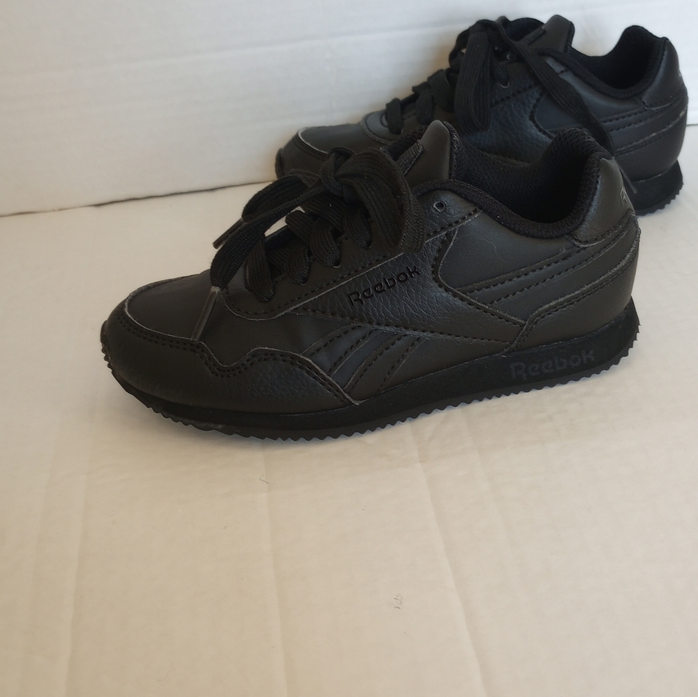 Rebook black shoes size 11.5 .for kids pre-owned good condition